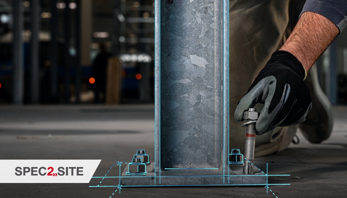 A worker installs a baseplate by inserting an expansion anchor into a hole