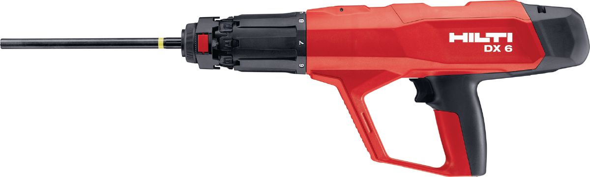 DX 6 Powder-actuated tool with fastener guide for fastening insulation material up to 140 mm thickness.