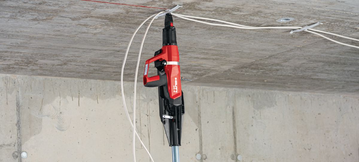 Installing cable clasp with powder-actuated tool DX 6-F8 pole tool