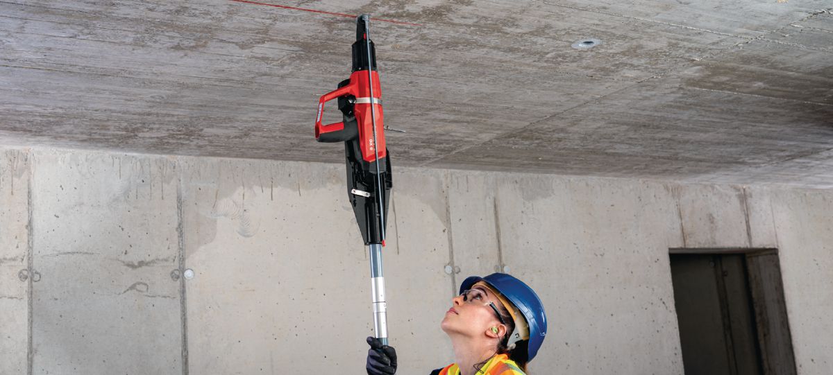 Installing drop rod with powder-actuated tool DX 6-F8 pole tool
