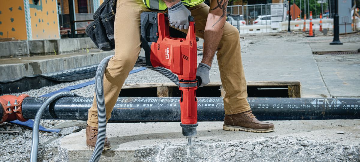 Concrete   demolition with TE 60-22 cordless combihammer, dust removal system and   backpack vacuum cleaner