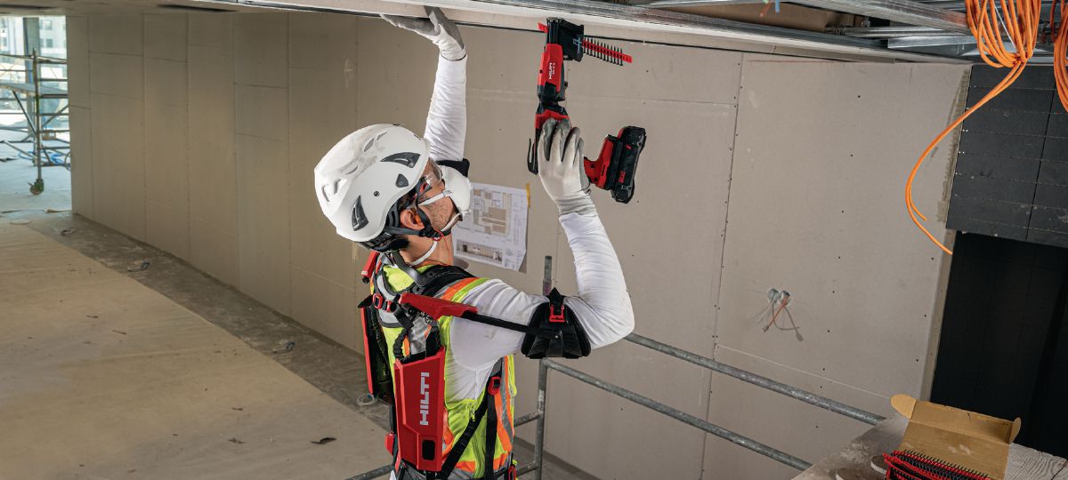 Fastening drywall boards to metal track or wood framing on walls and ceilings with the SD 5000-22.